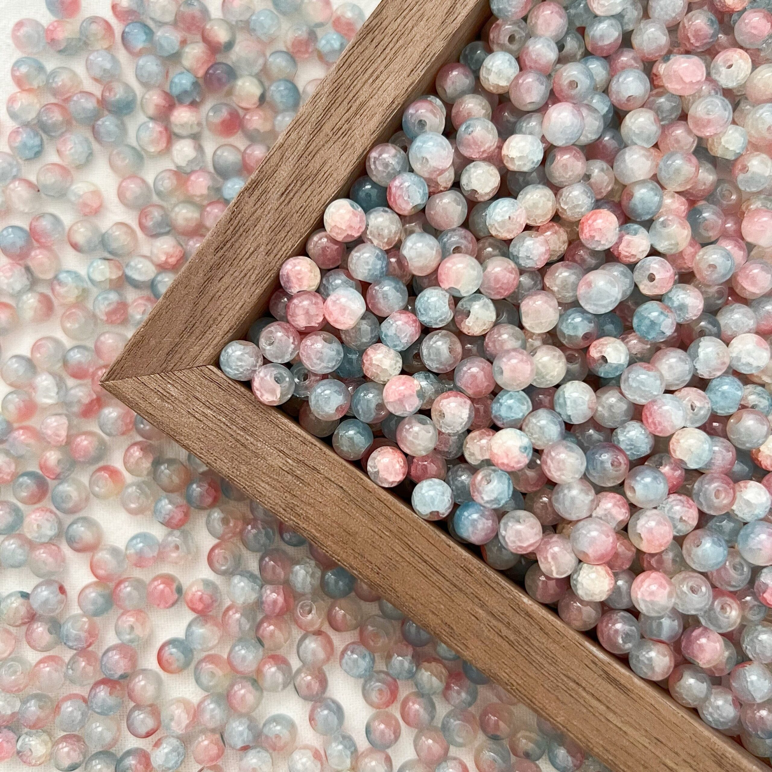 An application scenario or product detail of 6mm blue pink round crackle beads - Image 2