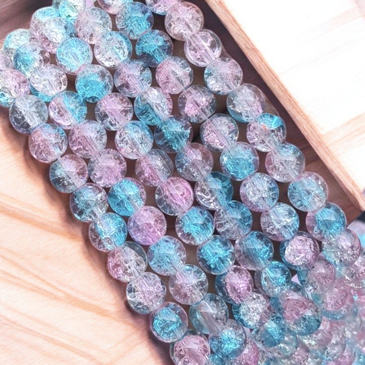 An application scenario or product detail of 6mm blue pink round crackle beads - Image 11