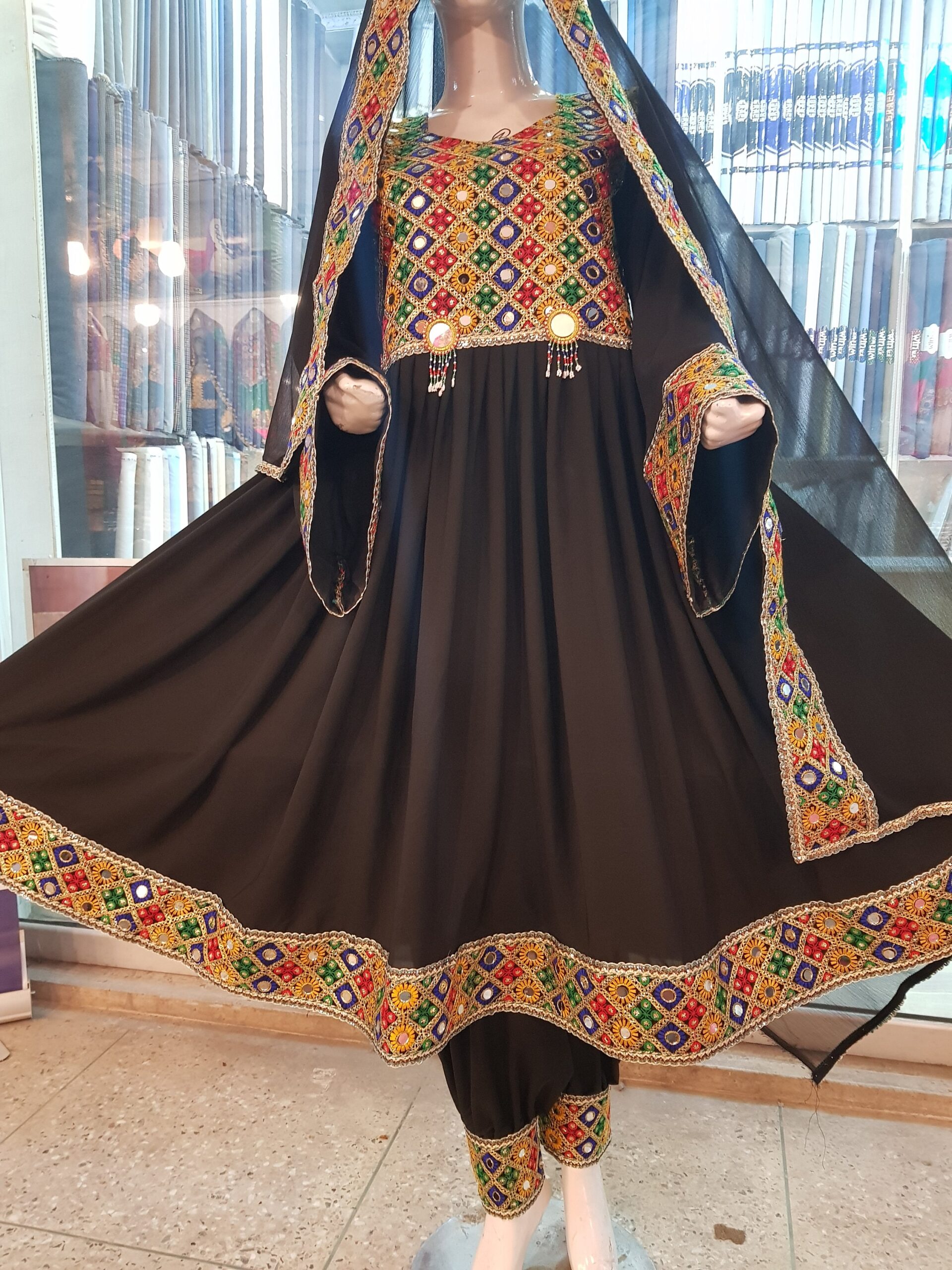 An application scenario or product detail of afghani dress - Image 6