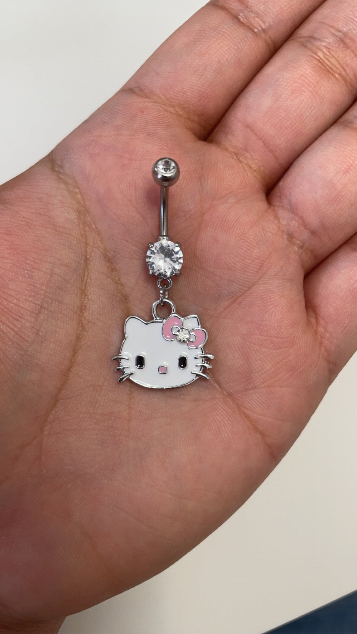 An application scenario or product detail of hello kitty belly ring - Image 13