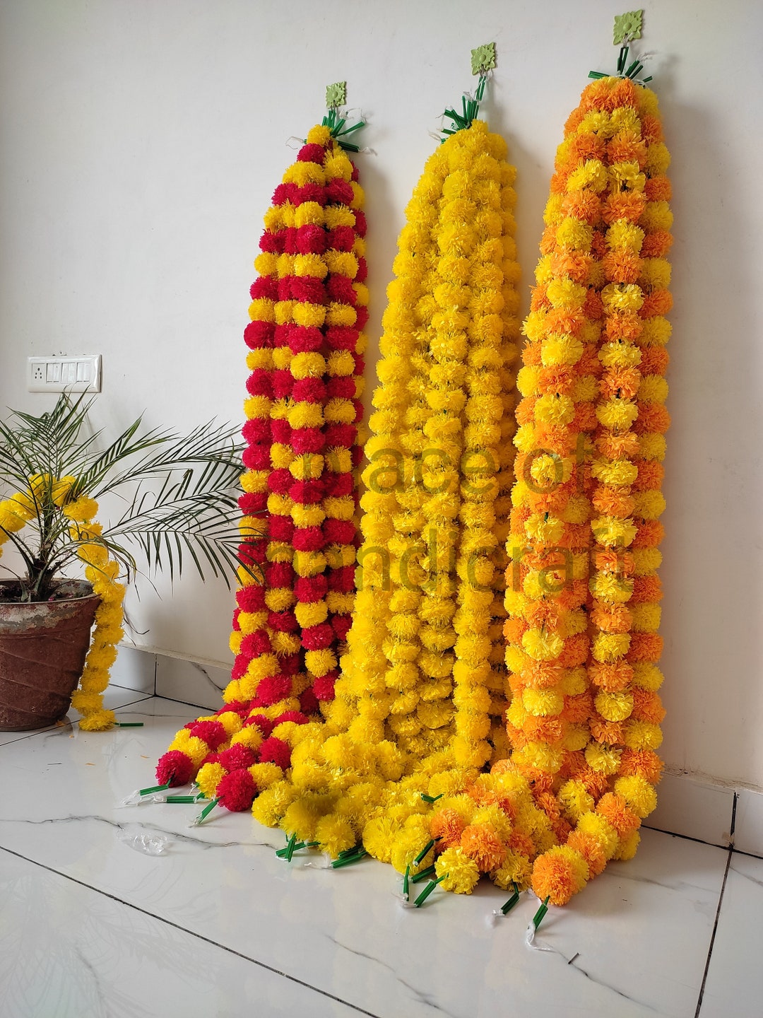 An application scenario or product detail of marigold garland - Image 1
