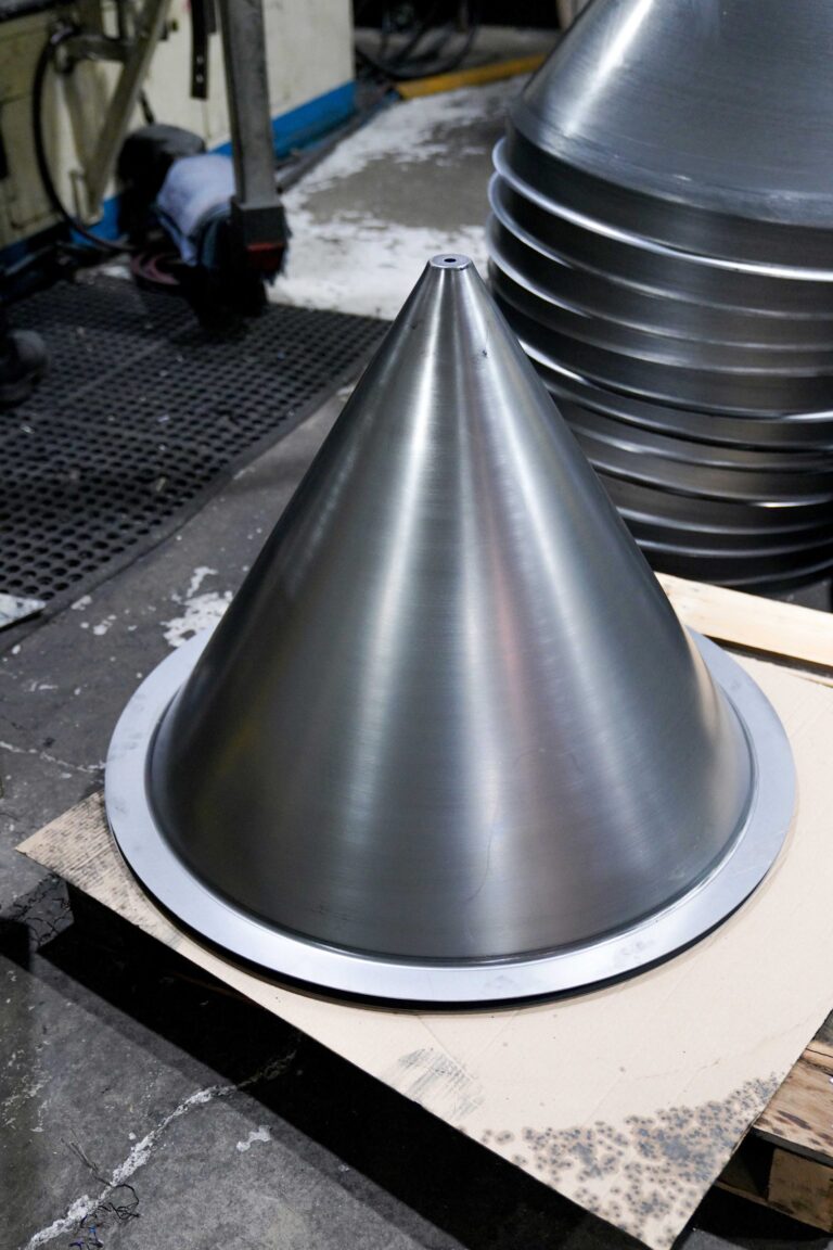 Featured image for the metal spinning for bulk handling guide
