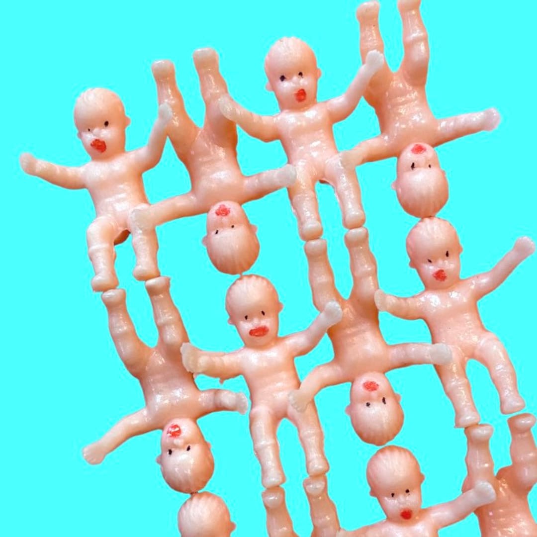 An application scenario or product detail of mini plastic babies - Image 12