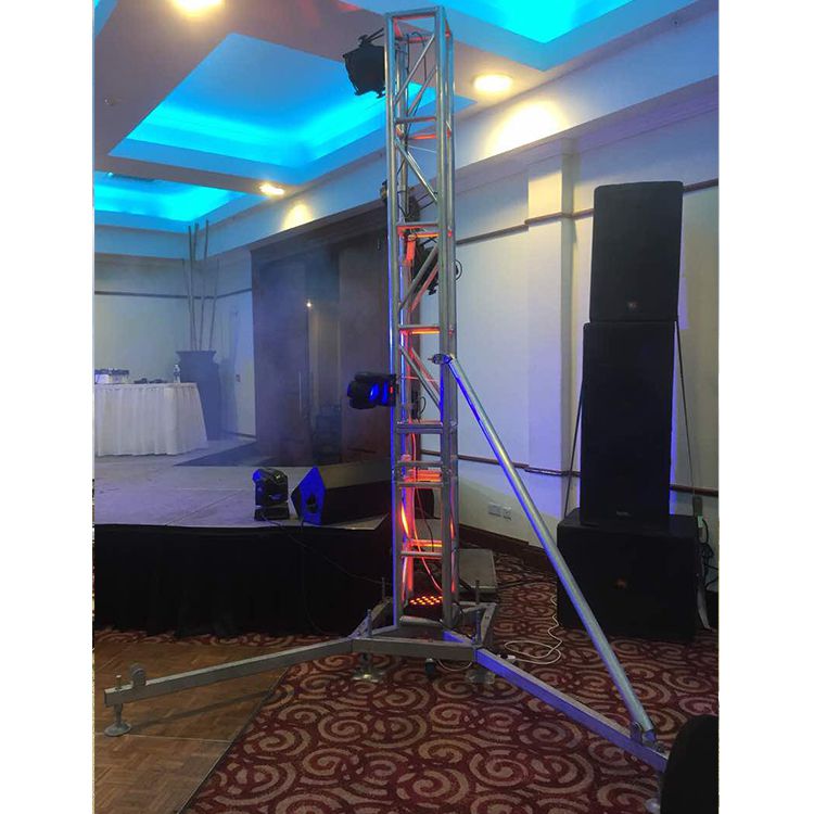 An application scenario or product detail of motorized dj projection screen on truss with projector - Image 11