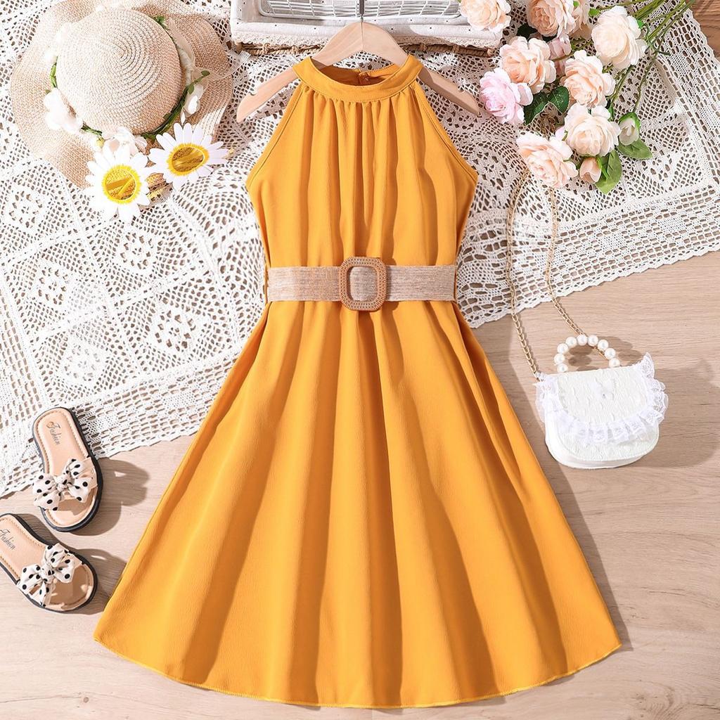 An application scenario or product detail of teen frock elastic top part in yellow - Image 1