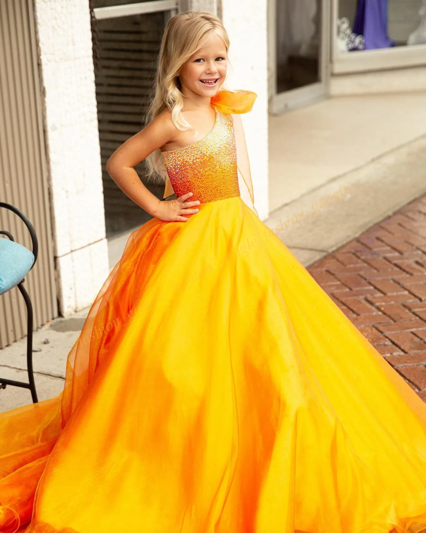 An application scenario or product detail of teen frock elastic top part in yellow - Image 4