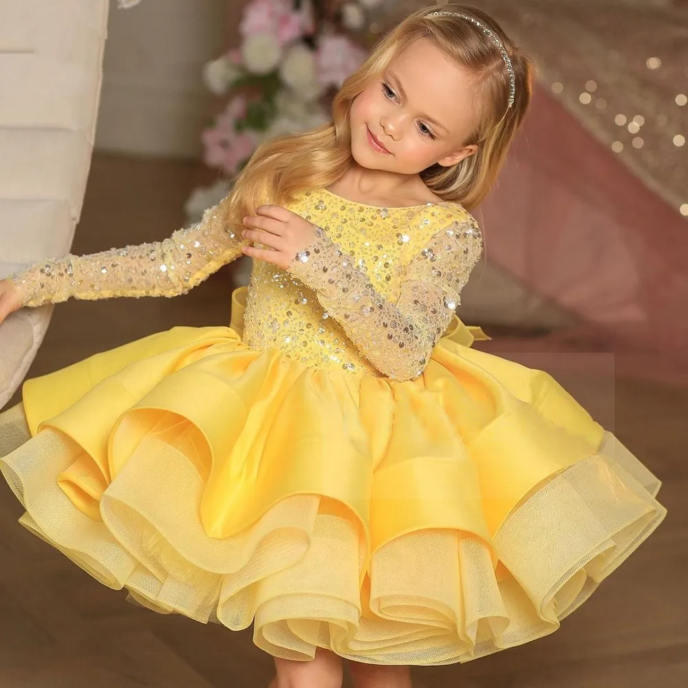 An application scenario or product detail of teen frock elastic top part in yellow - Image 11
