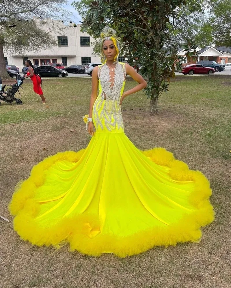 An application scenario or product detail of teen frock elastic top part in yellow - Image 17