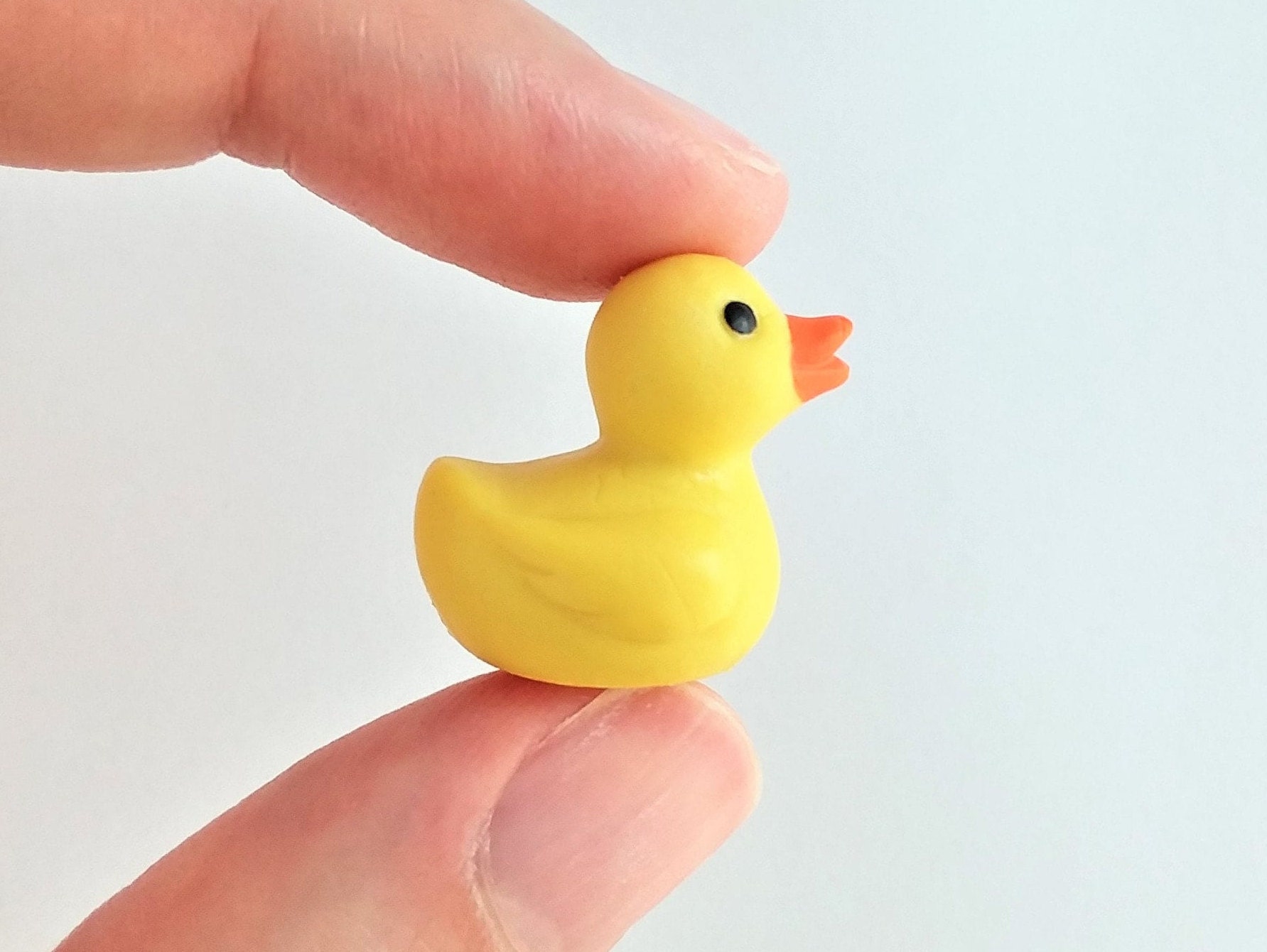 An application scenario or product detail of tiny plastic ducks - Image 20