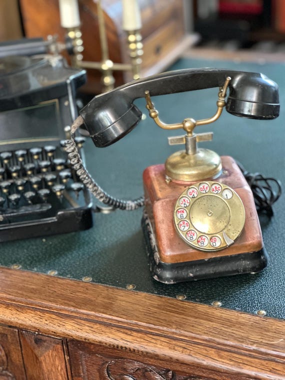 An application scenario or product detail of vintage rotary phone - Image 1